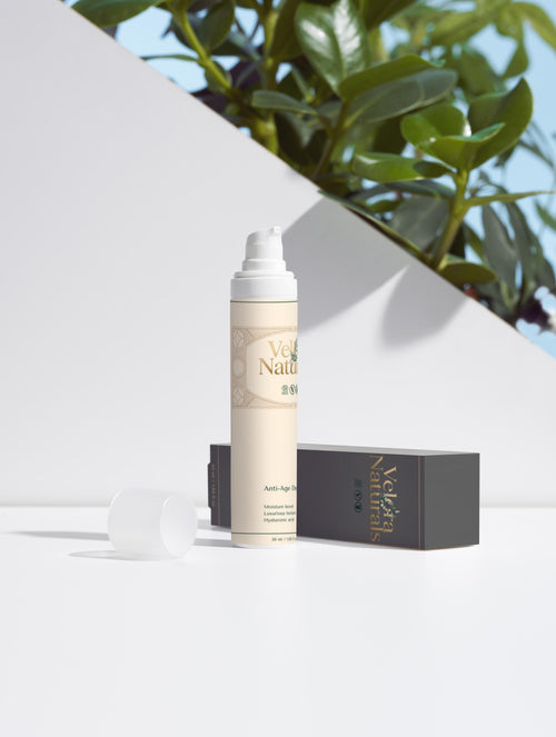 Velora Naturals Anti-Age Day Cream lifestyle with botanical greenery — moisturiser included in Complete Ritual Bundle, natural vegan anti-ageing skincare routine